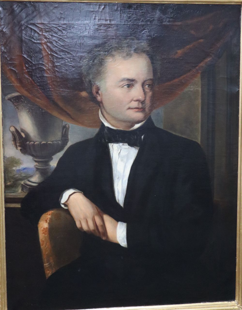 Victorian School, oil on canvas, Half length portrait of a seated gentleman, with urn and gardens beyond, 91 x 71cm